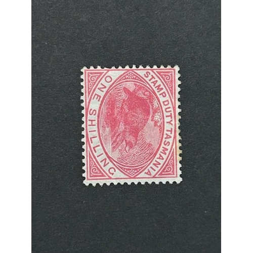 130 - Australian States: Tasmania 1880 1/- Postal Fiscal, average mint, odd fault SG F29. (1) (S)