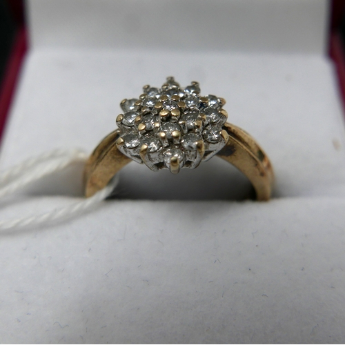 4 - A yellow gold and diamond cluster ring, 3.1grams