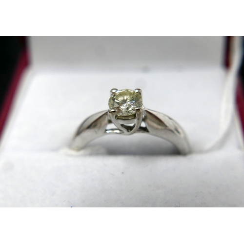 6 - A 9ct white gold solitaire diamond ring, in box, 0.25 carats