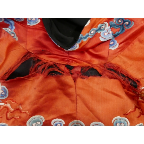 7 - A Chinese late Qing dynasty silk robe, c.1880/90, decorated with dragons chasing flaming pearls, amo... 