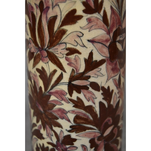 34 - A Persian Isfahan bamboo vase, decorated with stylised flowers. H.70cm