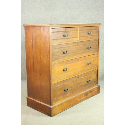 9 - A late Victorian walnut chest of two short over three long drawers, on a plinth base. H.113 W.110 D.... 