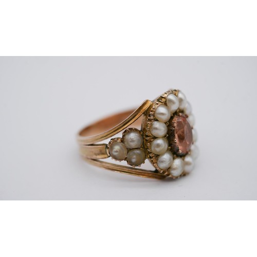 1 - A Georgian pearl and topaz yellow metal cluster ring. Set to centre with an oval foil backed peach t... 