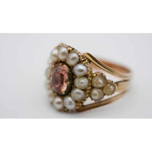 1 - A Georgian pearl and topaz yellow metal cluster ring. Set to centre with an oval foil backed peach t... 
