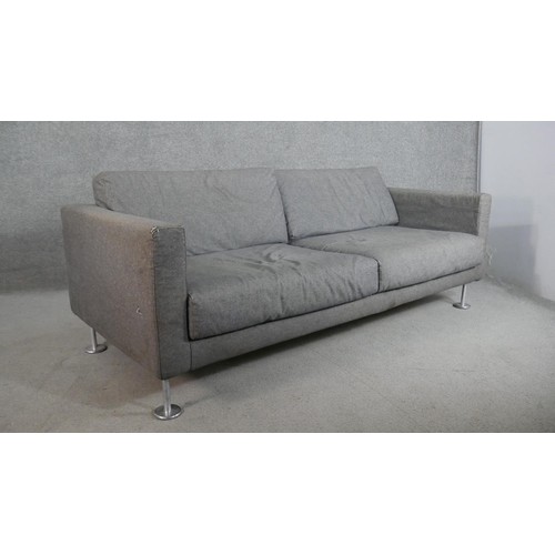 315 - Jasper Morrison for Vitra, a grey wool upholstered two seater sofa, on cylindrical tubular chromed l... 