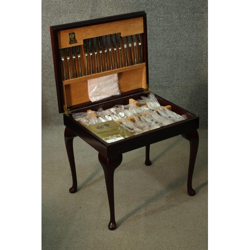 317 - An as new Arthur Price canteen of silver plated Country Plate flatware, mahogany cased with a tan to... 