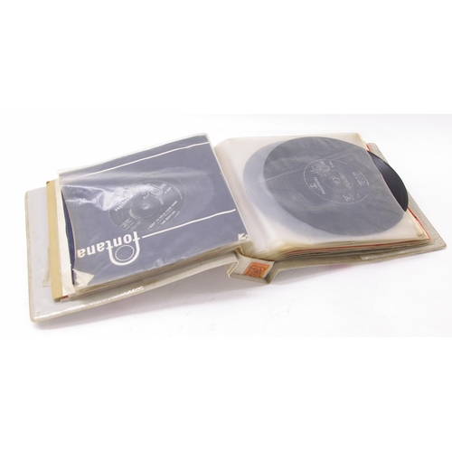 725 - The Beatles - ring binder containing a collection of nineteen Beatles 45rpm vinyl singles, to includ... 