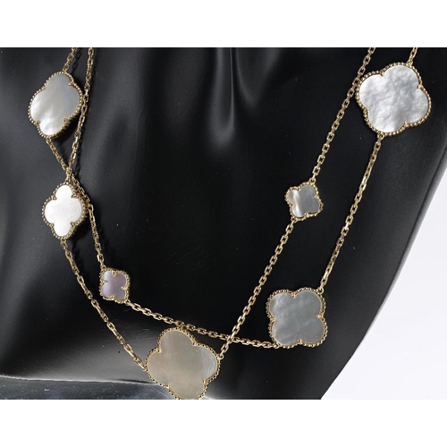 130 - 18k and mother of pearl set long chain with matching earrings, the necklet set with thirteen plaques... 