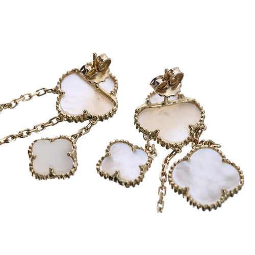 130 - 18k and mother of pearl set long chain with matching earrings, the necklet set with thirteen plaques... 