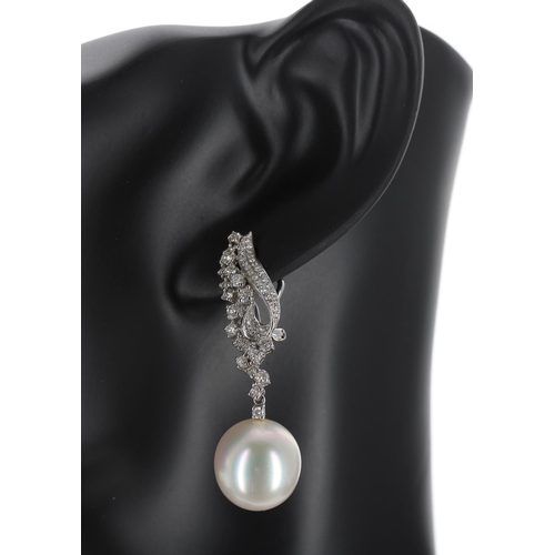 141 - Attractive pair of 18k white gold diamond and south sea pearl drop earrings, round brilliant-cuts, t... 