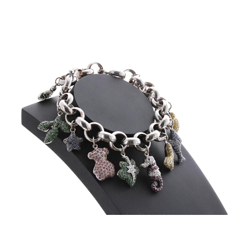 145 - White metal bracelet with twelve stone gem and diamond set charms, 72.6gm (365)