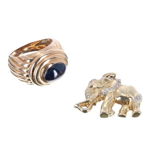 148 - 18k yellow gold elephant pendant, 5.1gm, 25mm; also an 18k sapphire cabouchon ring, 14mm, 9.5gm, rin... 