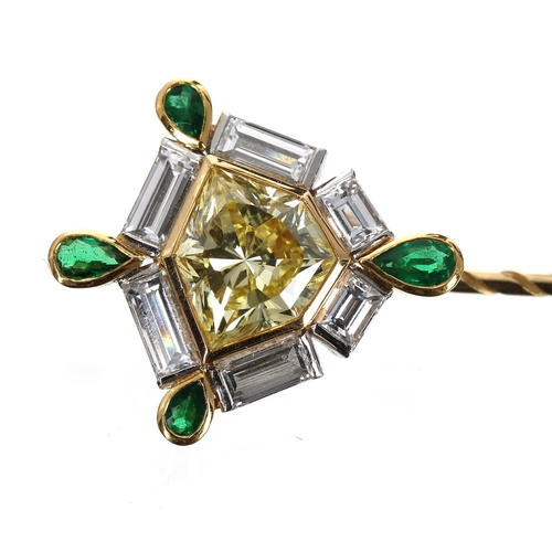 150 - Exquisite modified kite-shapped yellow diamond, baguette-cut diamond and emerald set pin, the yellow... 