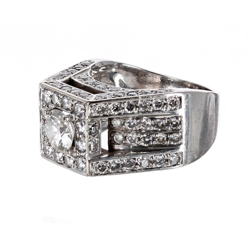 156 - Impressive white gold diamond set gentleman's ring, with a good quality central round brilliant-cut ... 