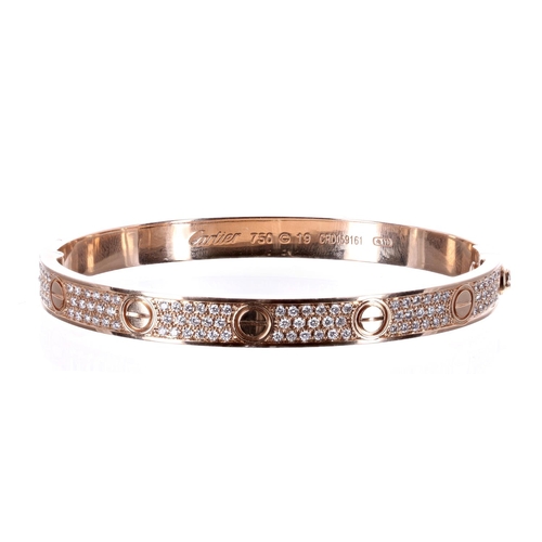 158 - Cartier 18ct rose gold diamond paved 'Love' bangle, size 19, set with 204 round brilliant-cut dimaon... 