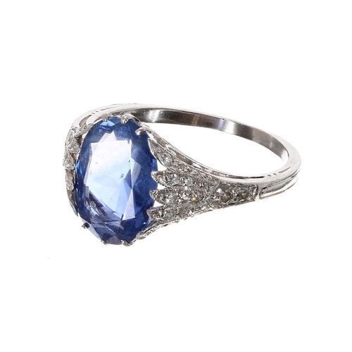 179 - Fine antique platinum sapphire and diamond ring, the oval sapphire 3ct approx, millegrain diamond se... 