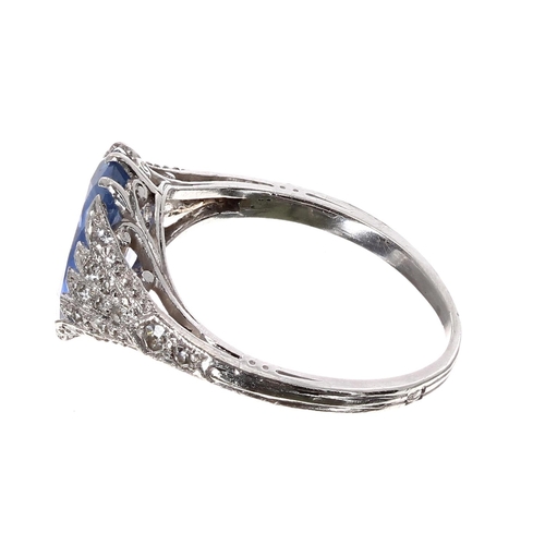 179 - Fine antique platinum sapphire and diamond ring, the oval sapphire 3ct approx, millegrain diamond se... 