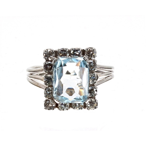 185 - Attractive white gold aquamarine and diamond rectangular dress ring, the aquamarine 1.79ct, with a s... 