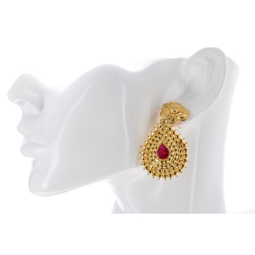 92 - High grade yellow metal earrings and choker set with red stones, 35.7gm, with cord (254)