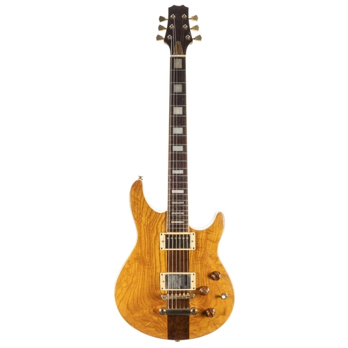 59 - Interesting unbranded solid body electric guitar; Finish: natural varnished ash veneered top with wa... 