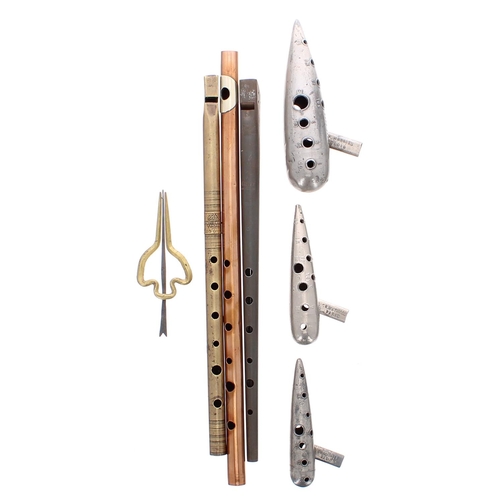 1518 - Set of three Charles Mathieu metal ocarinas; together with two penny whistles, a copper flute and a ... 