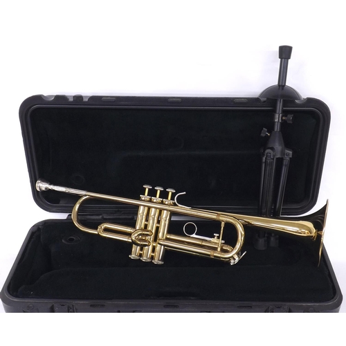 1227 - Bach gold lacquered trumpet, ser. no. P71609, mouthpiece, stand and case