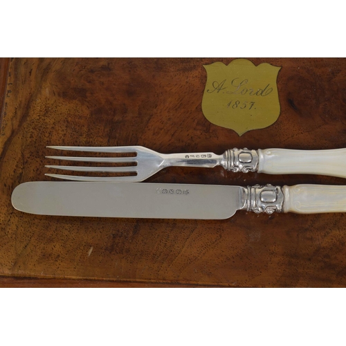 277 - Good Martin, Hall & Co. cased canteen of eighteen mother of pearl handled and silver dessert knives ... 