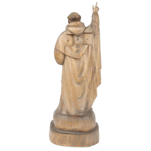 304 - 19th century carved lime wood figure, of a monk holding a bible and giving a blessing, 28