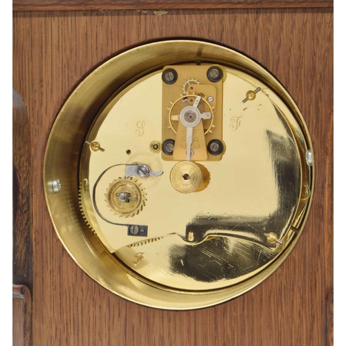 2520 - Small French oak cased eight day mantel clock timepiece with platform escapement, 7.75