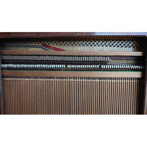 1226 - Rosewood cabinet piano by George Peachey of London, with cylinder keyboard cover over a recessed bea... 