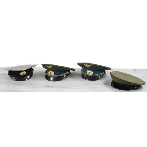 280 - Selection of four replica Soviet officer's peaked caps (4)... 