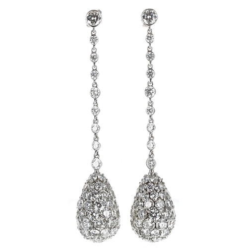 142 - Very fine pair of white gold diamond set pear shaped drop earrings, each set with single stone studs... 