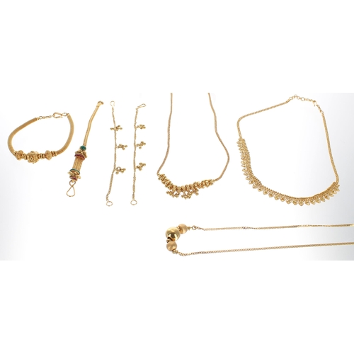 86 - Four assorted high grade yellow metal bracelets, with three assorted necklaces, 66.3gm (140186-6-A)... 