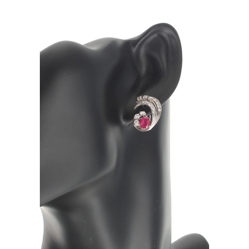 138 - Pair of 18k white gold ruby and diamond earrings, the oval rubies in each 0.60ct approx, diamonds 1.... 