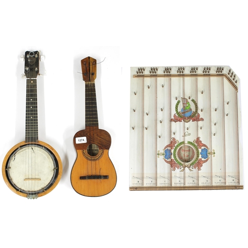 1274 - Juan Gomez labelled ukulele; also a Keech Patent Banjulele banjo, ser. no. A 10767, with modern mach... 