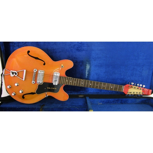 105 - 1960s Baldwin 712 twelve string electric guitar, ser. no. 0669, red finish which has faded to the fr... 