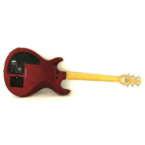 79 - Line 6 Variax electric guitar, made in Korea, ser. no. 03038997, red finish, electrics appear to be ... 