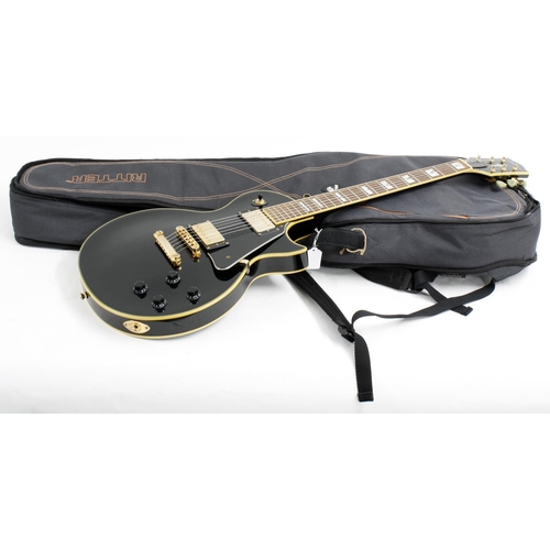 381 - Jay Turser JT-220 electric guitar; Finish: black, surface buckle marks to back; Fretboard: rosewood;... 