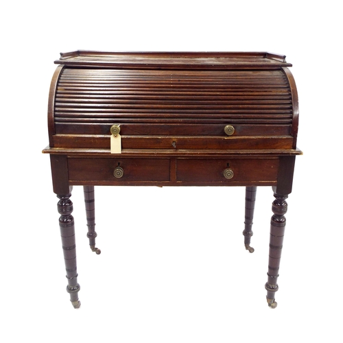 208 - Late 19th century mahogany roll top desk, the tambour front enclosing a fitted interior over a pull-... 