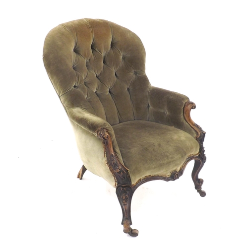 230 - Victorian button back upholstered chair upon castors (a.f.)