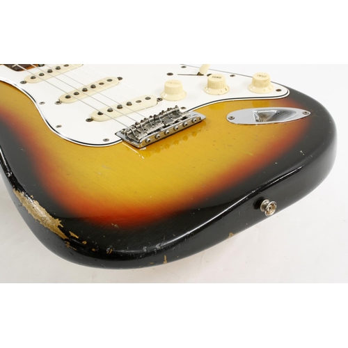 348 - 1965 Fender Stratocaster electric guitar, made in USA, ser. no. L5xxx6; Finish: sunburst, buckle ras... 