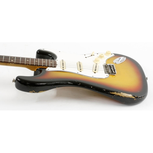 348 - 1965 Fender Stratocaster electric guitar, made in USA, ser. no. L5xxx6; Finish: sunburst, buckle ras... 