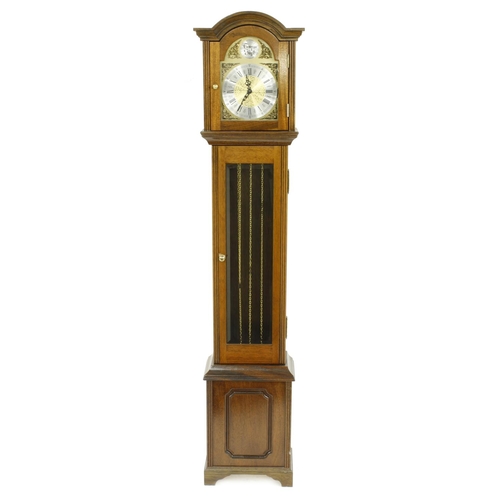 1319 - Contemporary mahogany three train grandmother clock, the 8