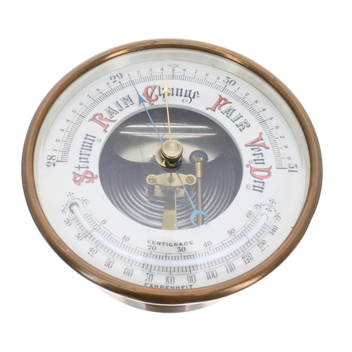 1074 - Brass drumhead aneroid barometer, 4.75