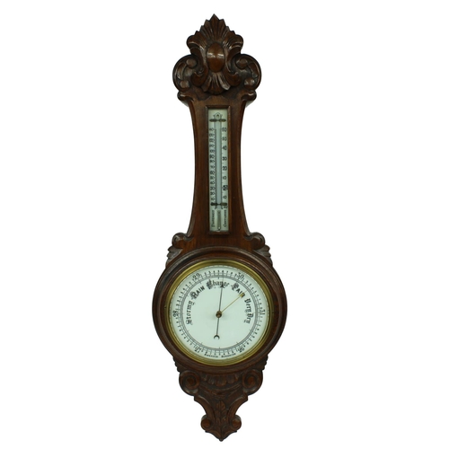 1079 - Oak aneroid barometer/thermometer, the 8