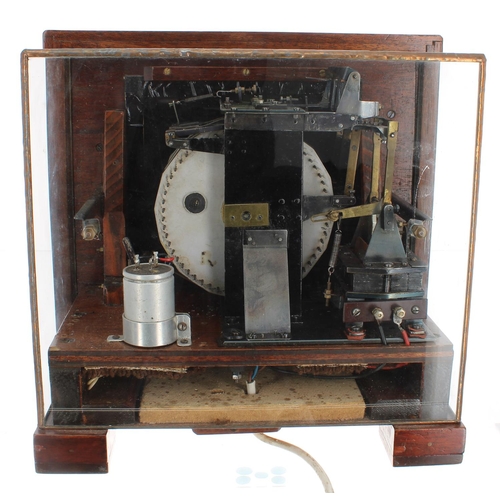 1096 - Interesting and unusual electric master tall wall clock, the electrics and brass bob pendulum housed... 