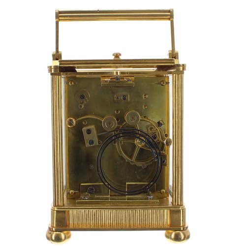 1142 - Good French ormolu carriage clock striking on a gong, the silvered engine turned dial signed Garnier... 