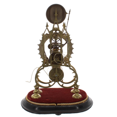 1259 - Brass single fusee skeleton clock with passing strike on a bell, with 5.75