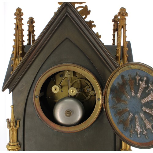 1258 - French ecclesiastical inspired bronze and ormolu two train gothic mantel clock, the movement back pl... 