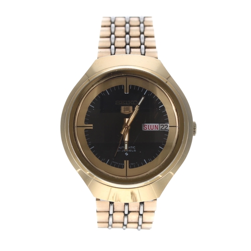 126 - Seiko 5 Helmet automatic gold plated gentleman's wristwatch, ref. 6319-7010, the black dial with day... 